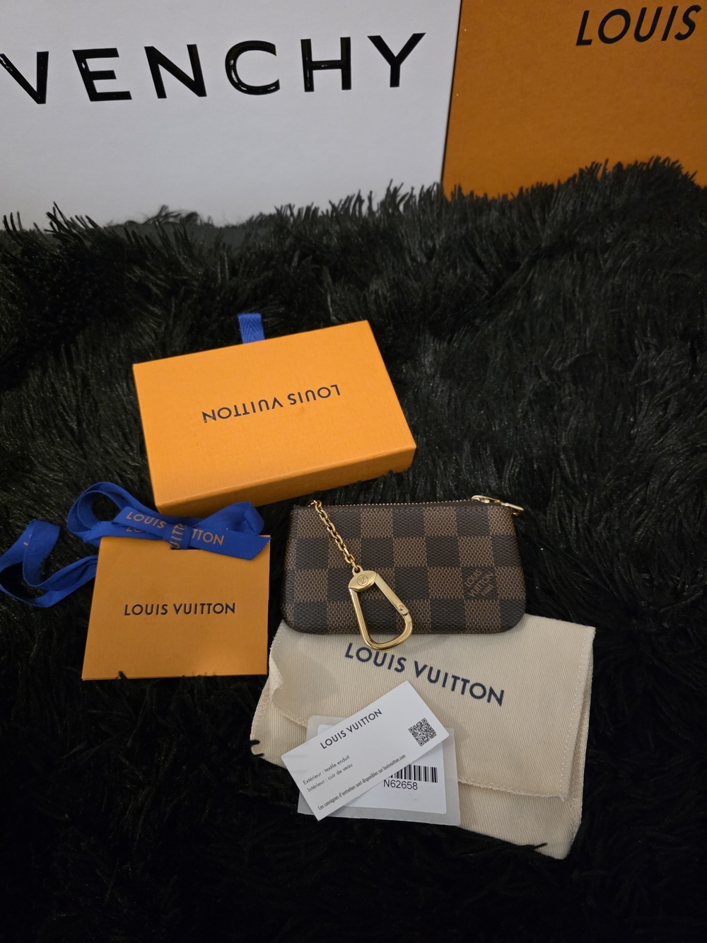 Authentic Louis Vuitton Damier Ebene Key Pouch with Gold Hardware